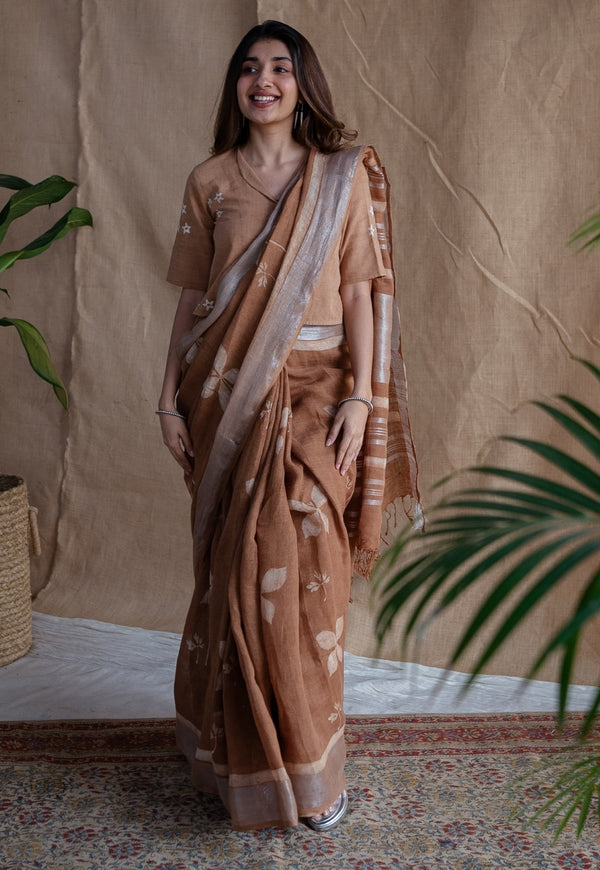 Light Brown Floral Butti Dabu Linen Silver Zari Border Saree