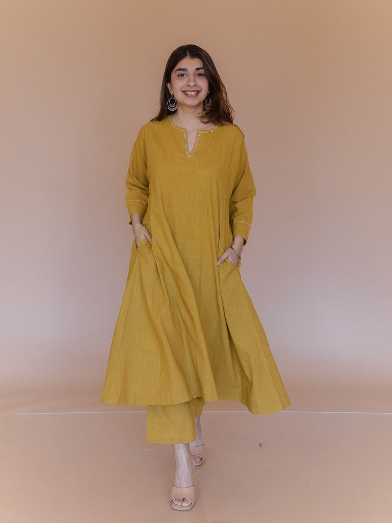 Nyra Yellow Solid Slub Cotton Jhabbha Kali Kurta with Hand Embroidery