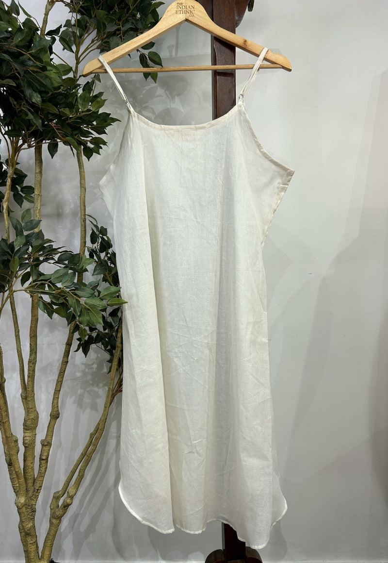Off White Solid Mul Cotton Straight Slip