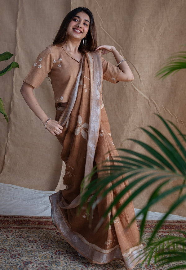 Light Brown Floral Butti Dabu Linen Silver Zari Border Saree