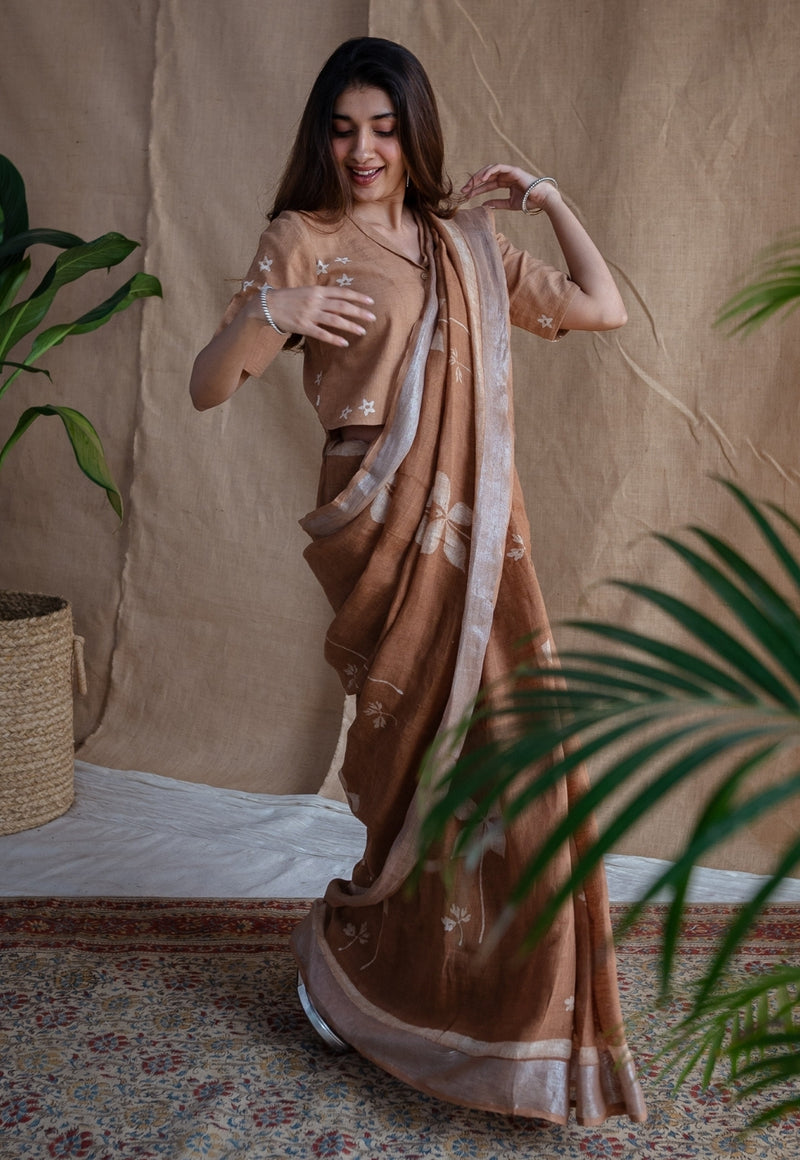 Light Brown Floral Butti Dabu Linen Silver Zari Border Saree