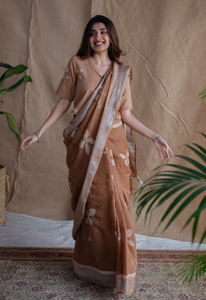 Light Brown Floral Butti Dabu Linen Silver Zari Border Saree