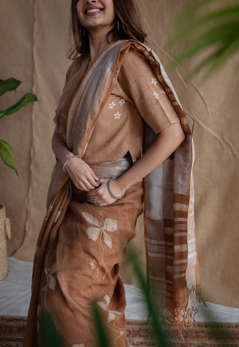 Light Brown Floral Butti Dabu Linen Silver Zari Border Saree