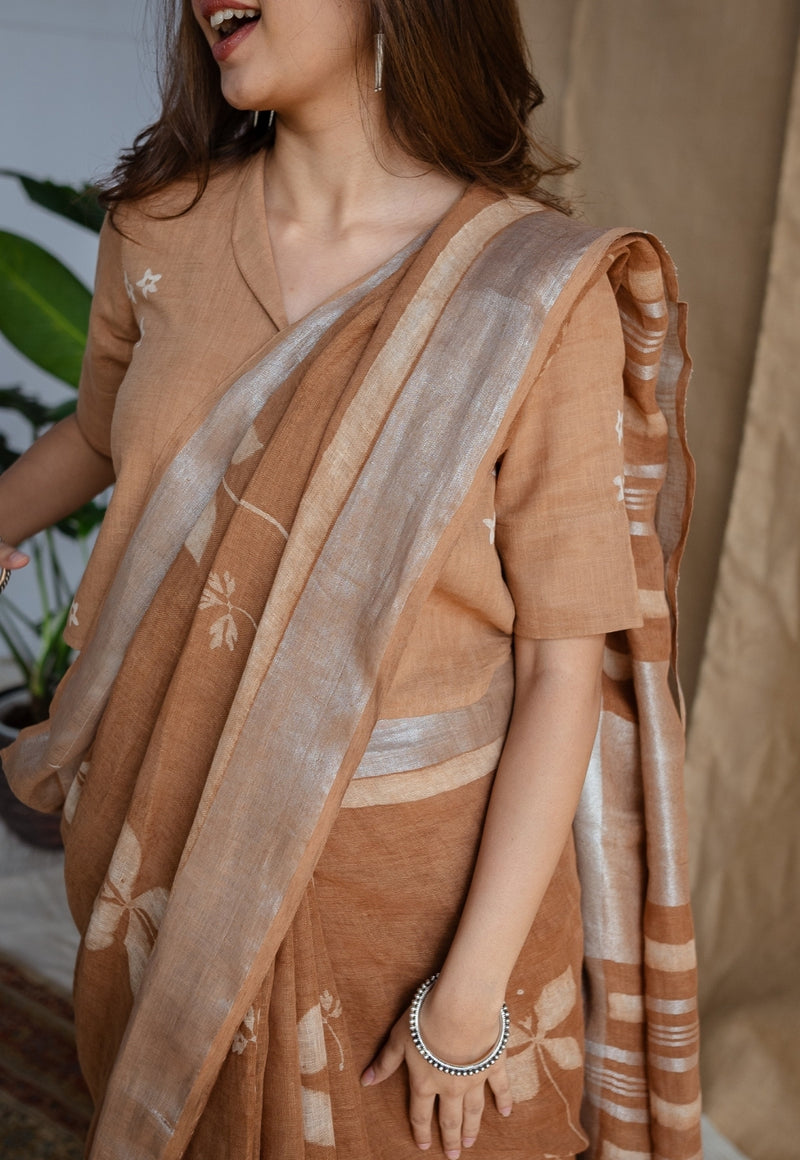 Light Brown Floral Butti Dabu Linen Silver Zari Border Saree