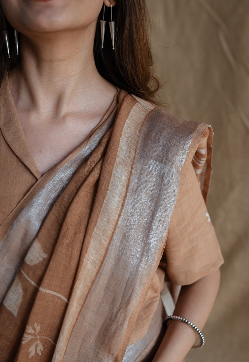 Light Brown Floral Butti Dabu Linen Silver Zari Border Saree