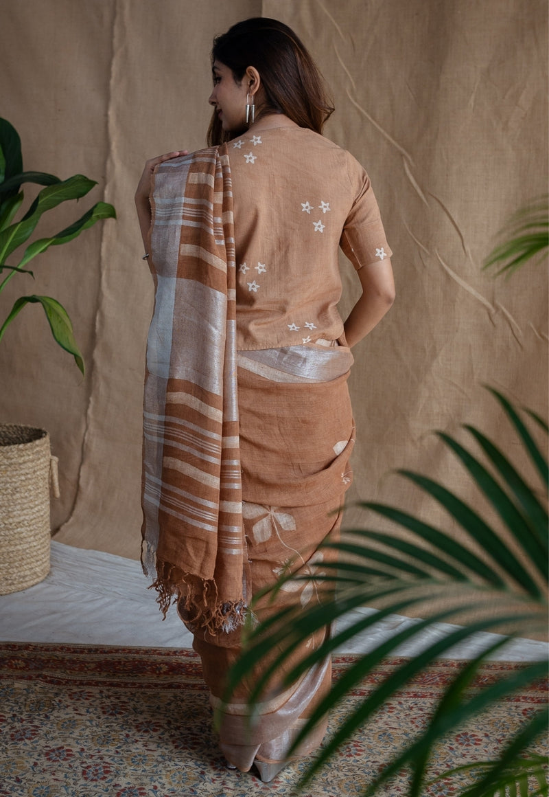 Light Brown Floral Butti Dabu Linen Silver Zari Border Saree