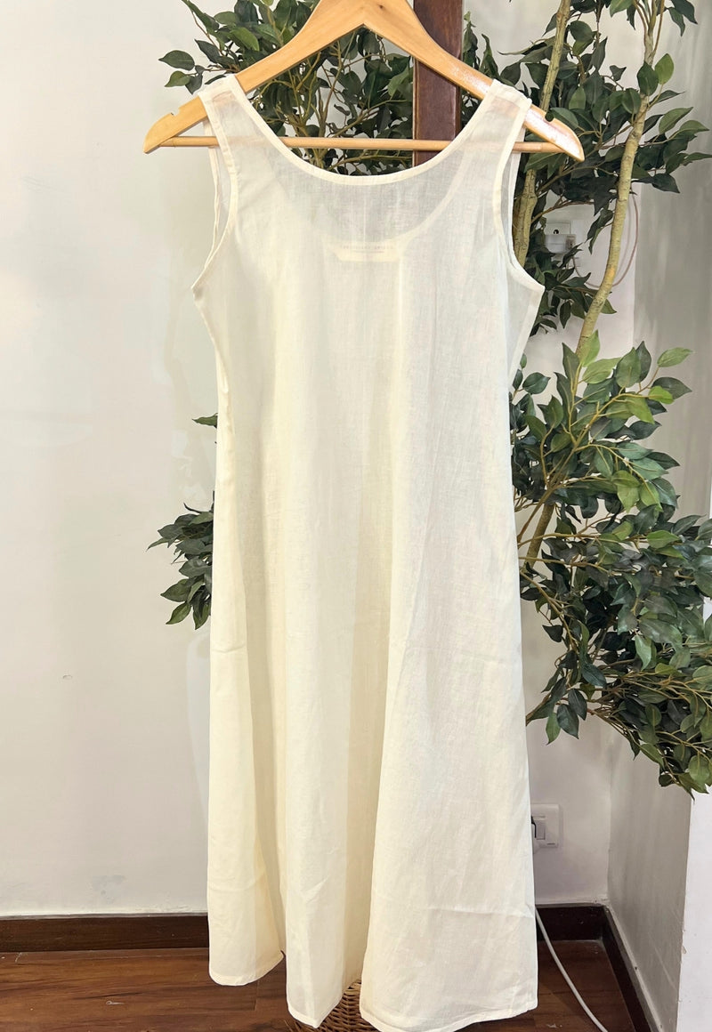 Off White Solid Mul Cotton A Line Slip